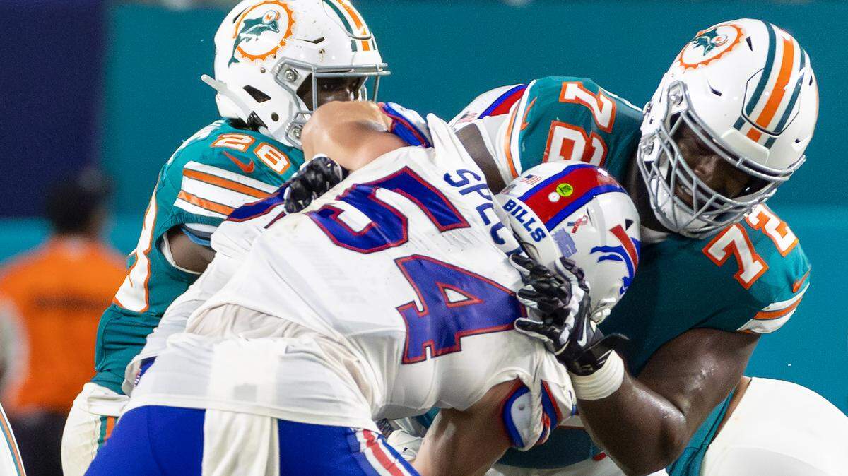 Miami Dolphins offensive tackle Terron Armstead (72) blocks Buffalo Bills linebacker Baylon Spector (54) in the first half of their NFL game at Hard Rock Stadium on Thursday, Sept. 12, 2024, in Miami Gardens, Fla.