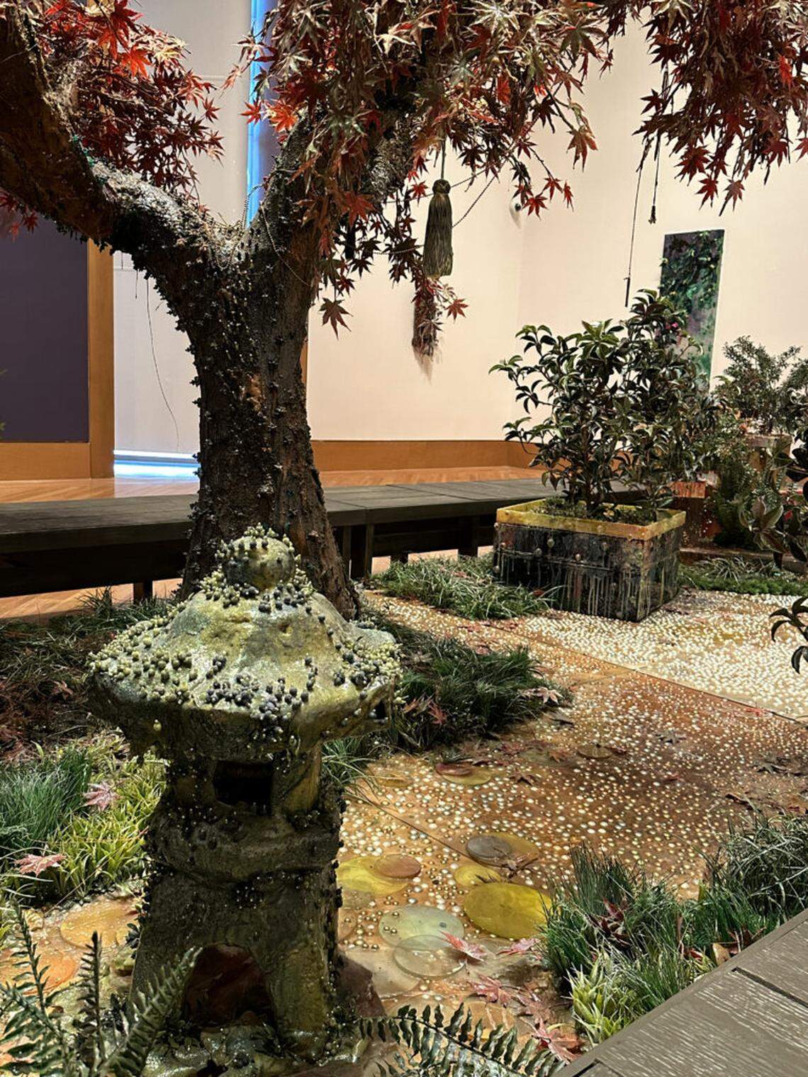 “Endless Autumn” is a sculpture of a jeweled Japanese garden created out of plastic by Cristina Lei Rodriguez.