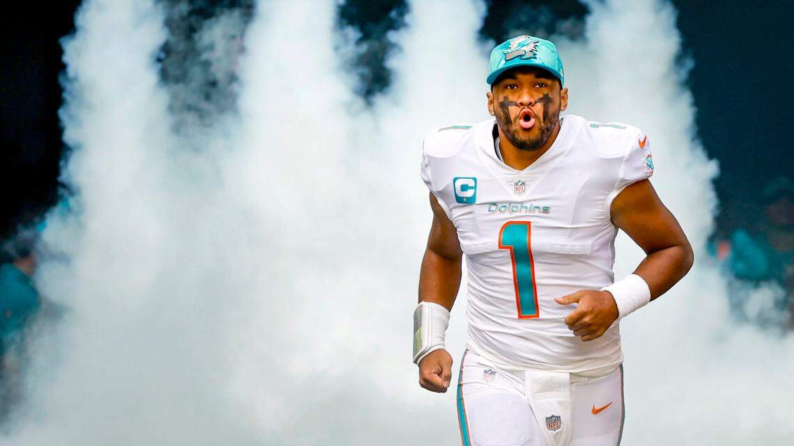 Miami Dolphins quarterback Tua Tagovailoa (1) runs onto the field during introductions before the start of the game against the Houston Texans at Hard Rock Stadium in Miami Gardens on Sunday, November 27, 2022.