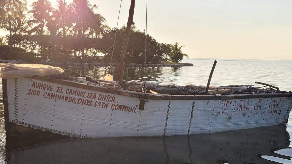 A migrant boat is moored to shore in the Florida Keys Thursday, May 18, 2023.