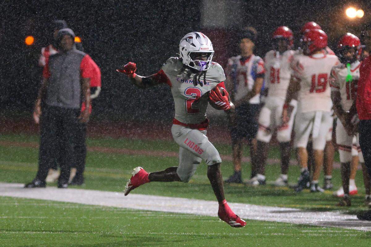 Chaminade-Madonna Lions running back Arwin Jackson (2) carries the football against the Monarch Knights during the second quarter of a high school football game at Chaminade-Madonna College Preparatory school in Hollywood, Florida, Friday, October 3, 2025.