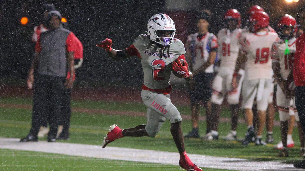 Chaminade-Madonna Lions running back Arwin Jackson (2) carries the football against the Monarch Knights during the second quarter of a high school football game at Chaminade-Madonna College Preparatory school in Hollywood, Florida, Friday, October 3, 2025.
