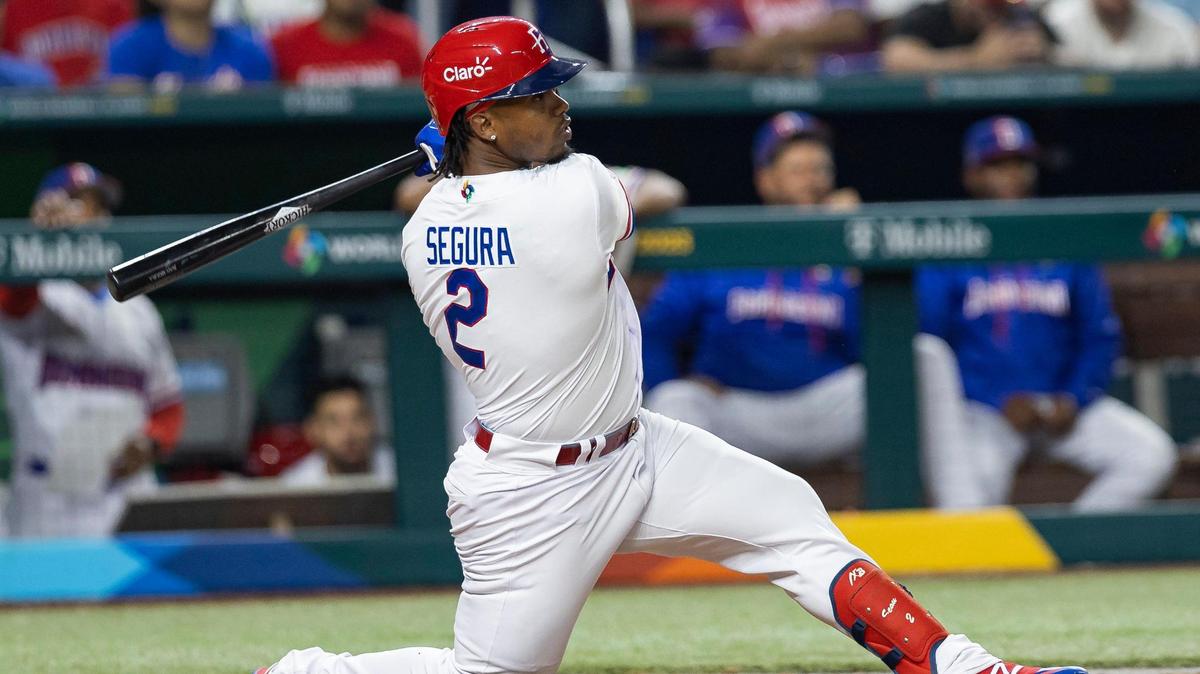 Dominican Republic infielder Jean Segura (2) hits a ground-rule double on a line drive to right-center field against Israel during the seventh inning of a Pool D game at the World Baseball Classic at loanDepot Park on Tuesday, March 14, 2023, in Miami, Fla.