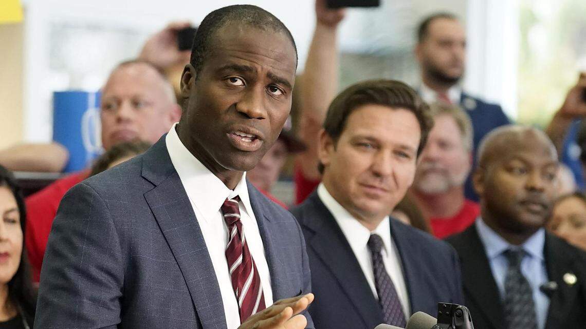 Florida’s Surgeon General Joseph Ladapo, left, and Gov. Ron DeSantis.