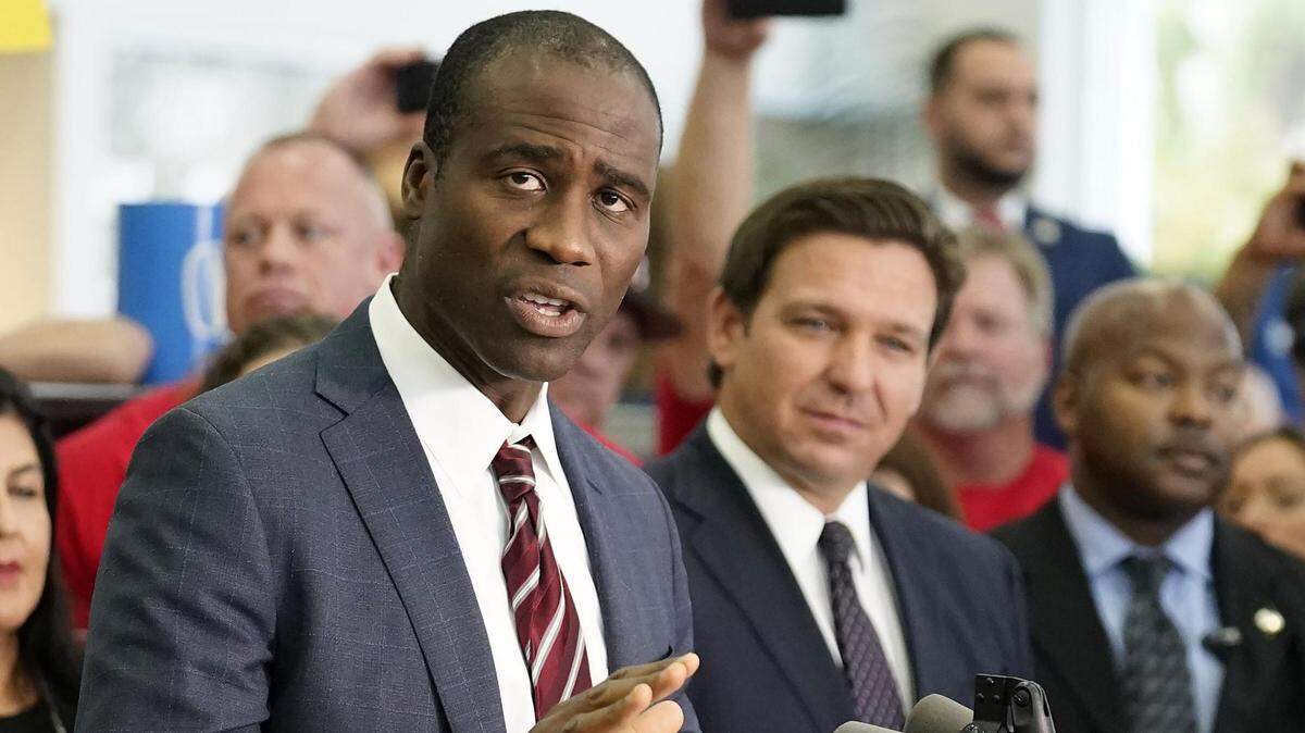 Florida’s Surgeon General Joseph Ladapo, left, and Gov. Ron DeSantis are leading the charge against transgender Floridians.
