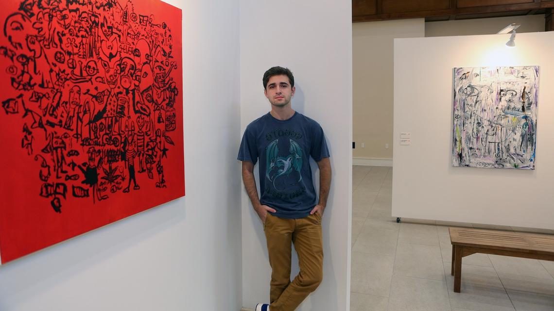 Matthew Hanzman, a 21 year old artist and University of Miami Student poses for the picture at Fairchild on Thursday July 26, 2018 in Coral Gables.