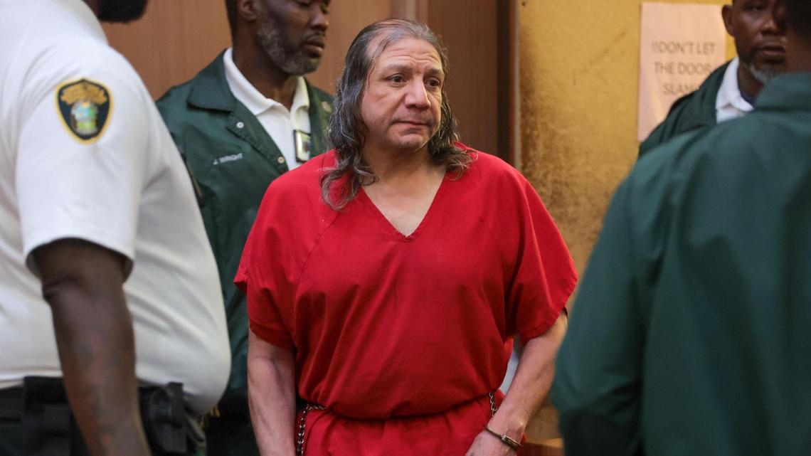 Jorge Barahona is led into a courtroom by Miami-Dade corrections officers for a competency hearing to determine if he has the ability to stand trial, Richard E. Gerstein Justice Building in Miami, Florida on July 22, 2025. He has been charged with murdering his 10-year-old adopted daughter and severely abusing her twin brother.