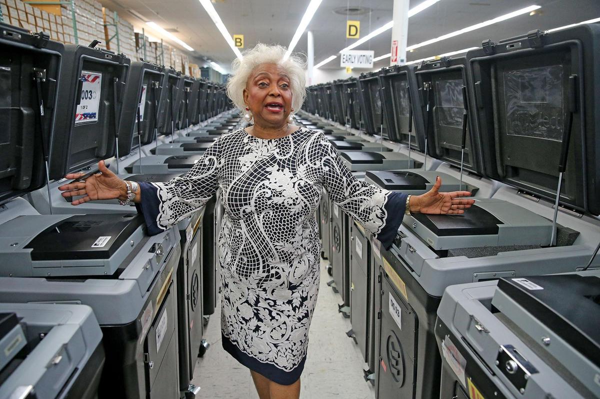 Brenda C. Snipes, Broward County Supervisor of Elections, talks about the higher tech voting booths — stored at the election office in Lauderhill — that will be used in the midterm election Nov. 6.