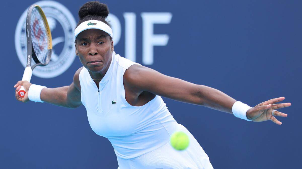 American tennis player Venus Williams returns the volley in Women's 1st Round of tennis match against British player Francesca Jones at the Miami Open on Thursday March 19, 2026, in Miami Gardens, Florida. 