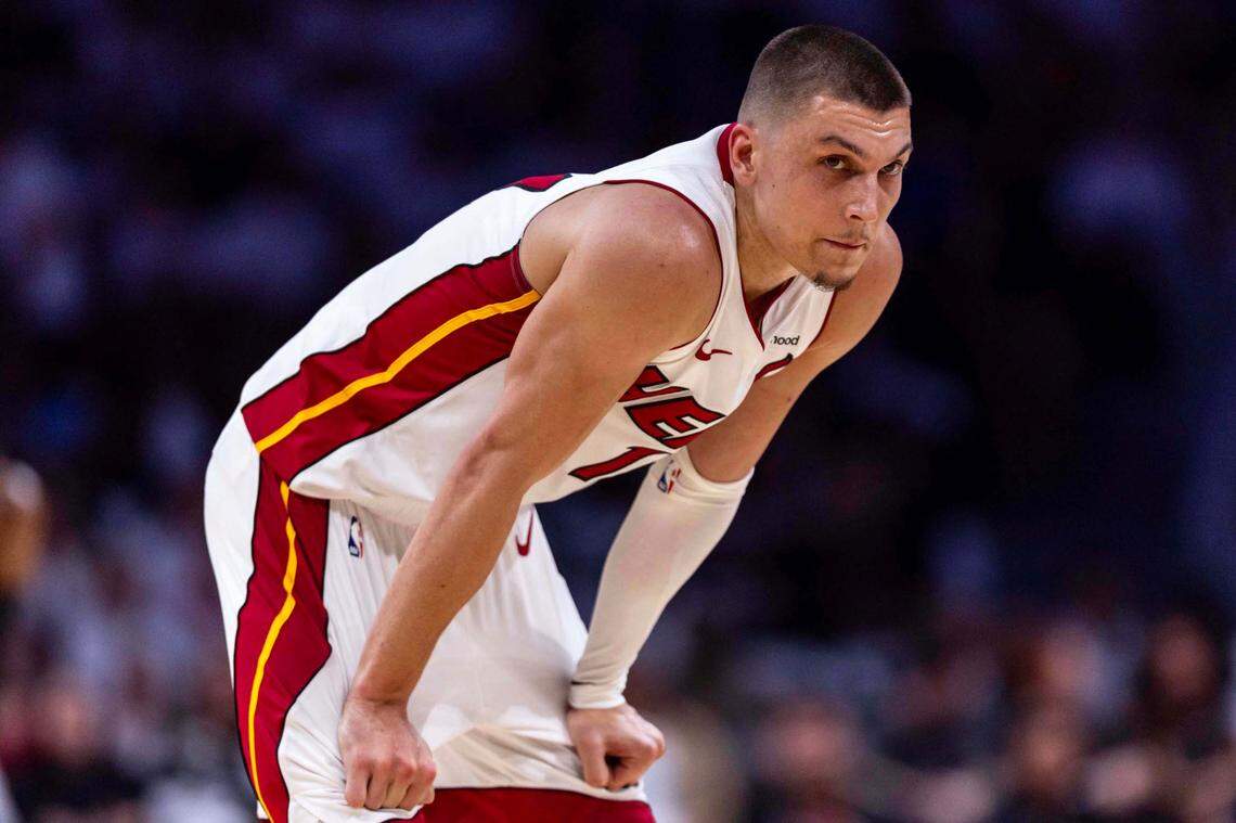 Miami Heat guard Tyler Herro (14) bends over in between plays during the second half of Game 4 of the Eastern Conference NBA Playoffs against the Cleveland Cavaliers at Kaseya Center on April 28, 2025, in Miami.