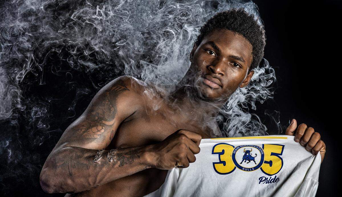 Miami Northwestern High School wide receiver Nicholas Lennear flashes the 305 during High School Football Media Day in Deerfield Beach, Florida on Saturday, August 2, 2025. 