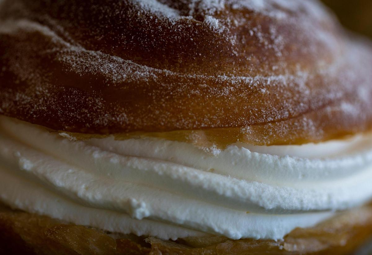 An ensaimada — light, sweet, coiled pastry stuffed with whipped cream — at CalaMillor Gourmet Experience in Miami.