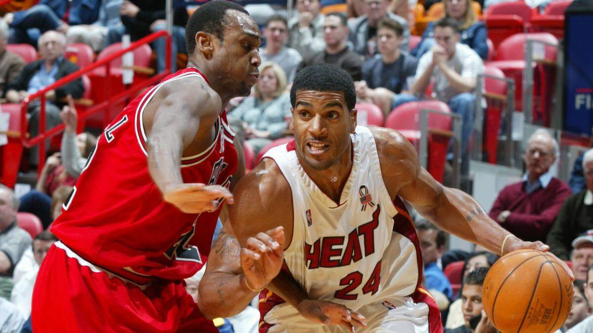 Jim Jackson, pictured as a member of the Miami Heat in a 2002 file photo, serves as the color commentator for the Big3 basketball league, which will be at Miami's AmericanAirlines Arena on Friday, July 20, 2018.