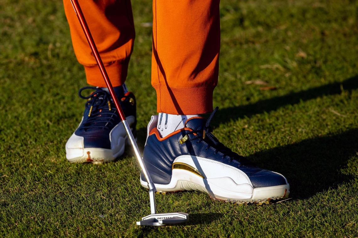 Eastside Golf founder Olajuwon Ajanaku wears the Jordan 12 Retro Low Golf shoes at Miami Springs Golf & Country Club in Miami Springs, Florida, on Saturday, December 10, 2022. Eastside Golf is a lifestyle golf brand developed to raise awareness about golf among youth and non golfers.