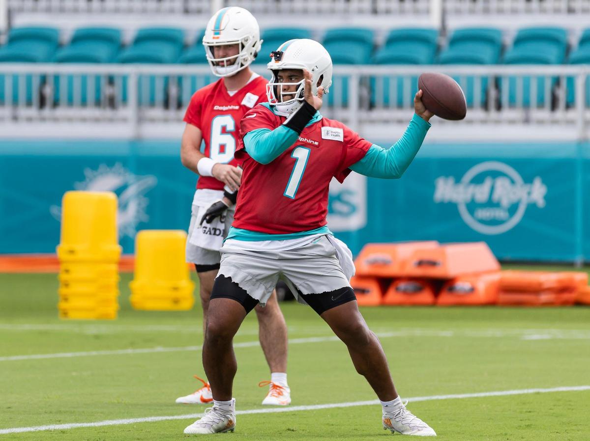 Miami Dolphins quarterback Tua Tagovailoa (1) throws the ball during team practice at the Baptist Health Training Complex on Wednesday, Oct. 25, 2023 in Miami Gardens, Fla.