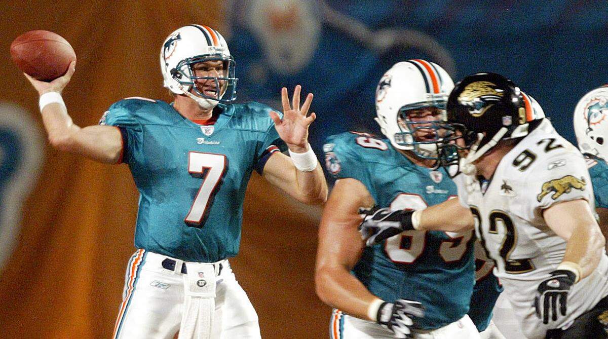 The Miami Dolphins host the Jacksonville Jaguars at Pro Player Stadium in Miami on Aug. 14, 2004 .A.J.Feeley throws for a 1st down in the second quarter.