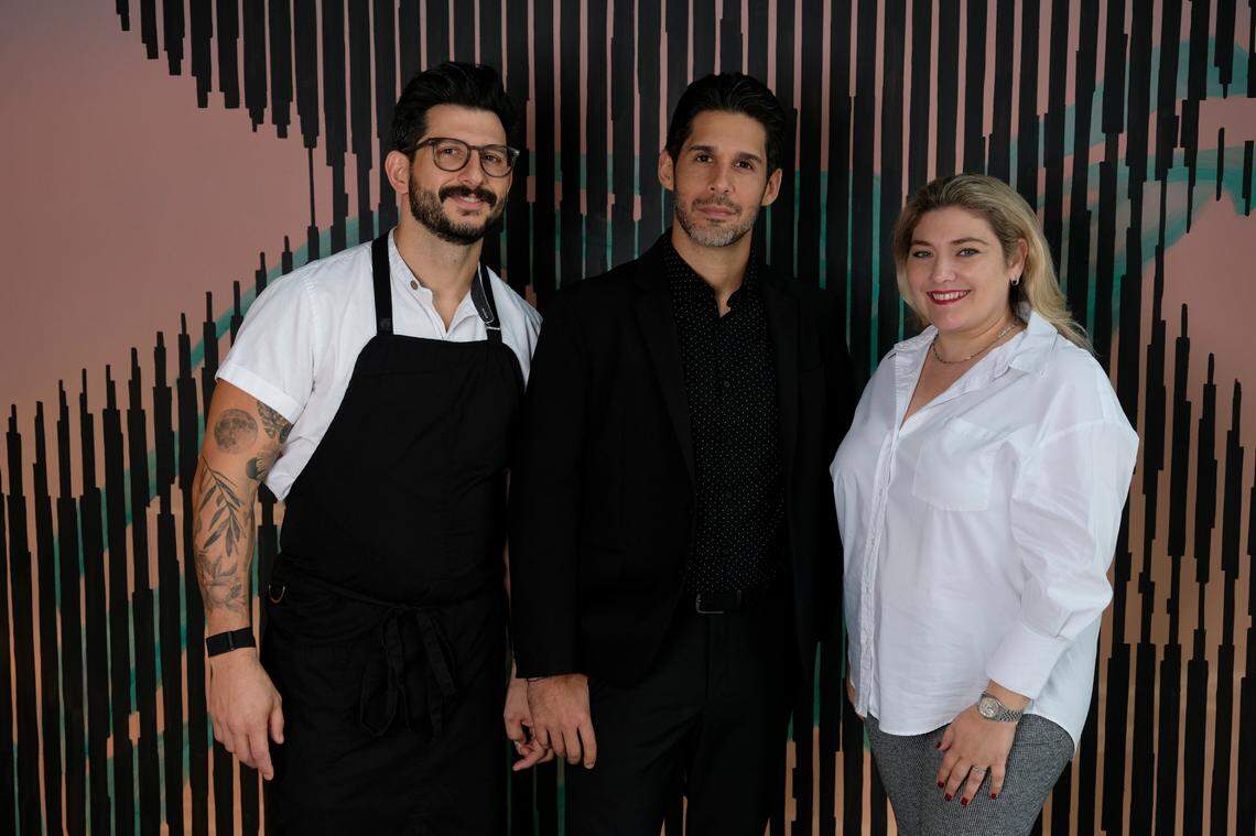 Chef Giorgio Rapicavoli, left, with his partners Alexander Casanova and Laura Faraci at the new Eating House restaurant.