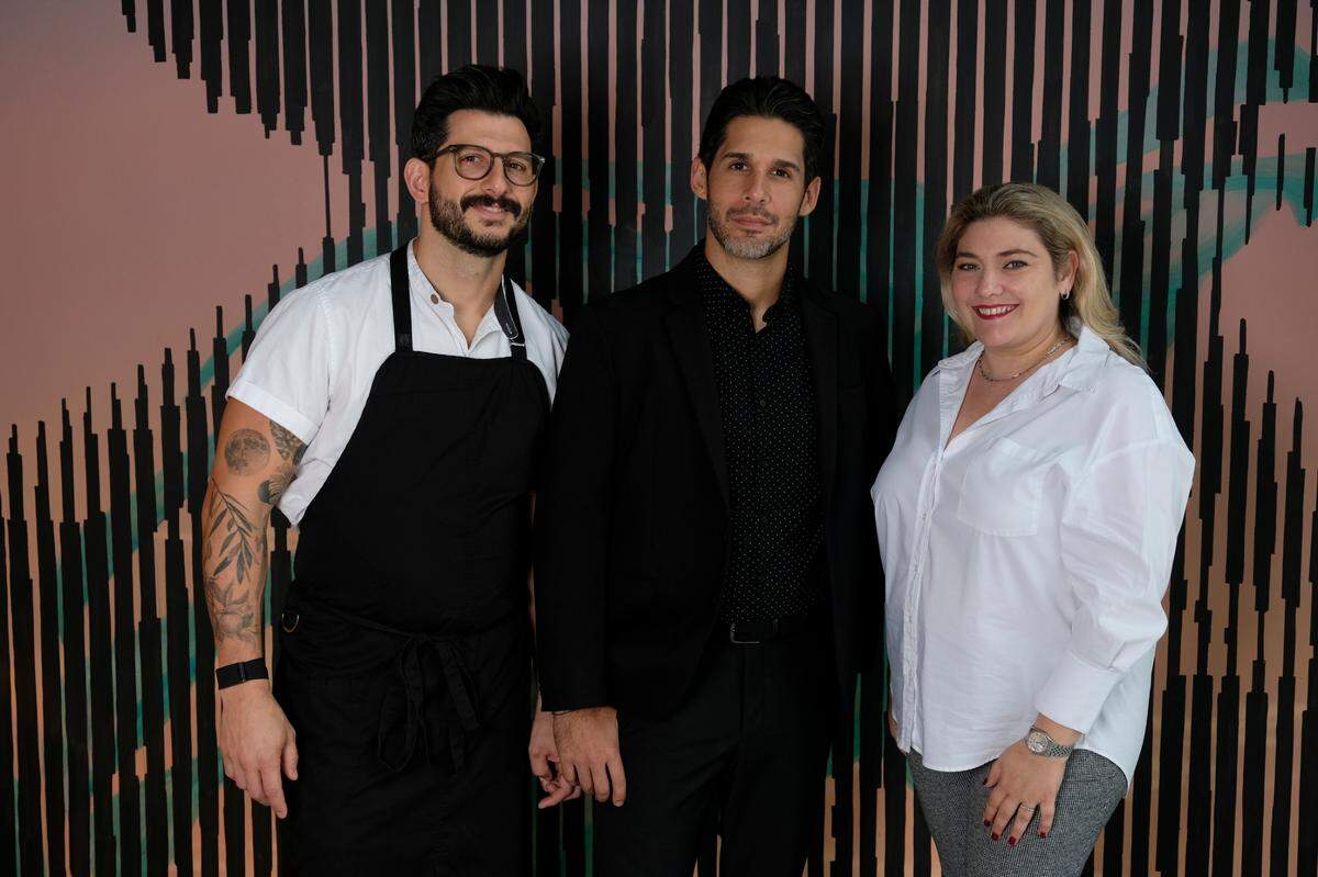 Chef Giorgio Rapicavoli with his partners Alexander Casanova and Laura Faraci at the new Eating House restaurant.