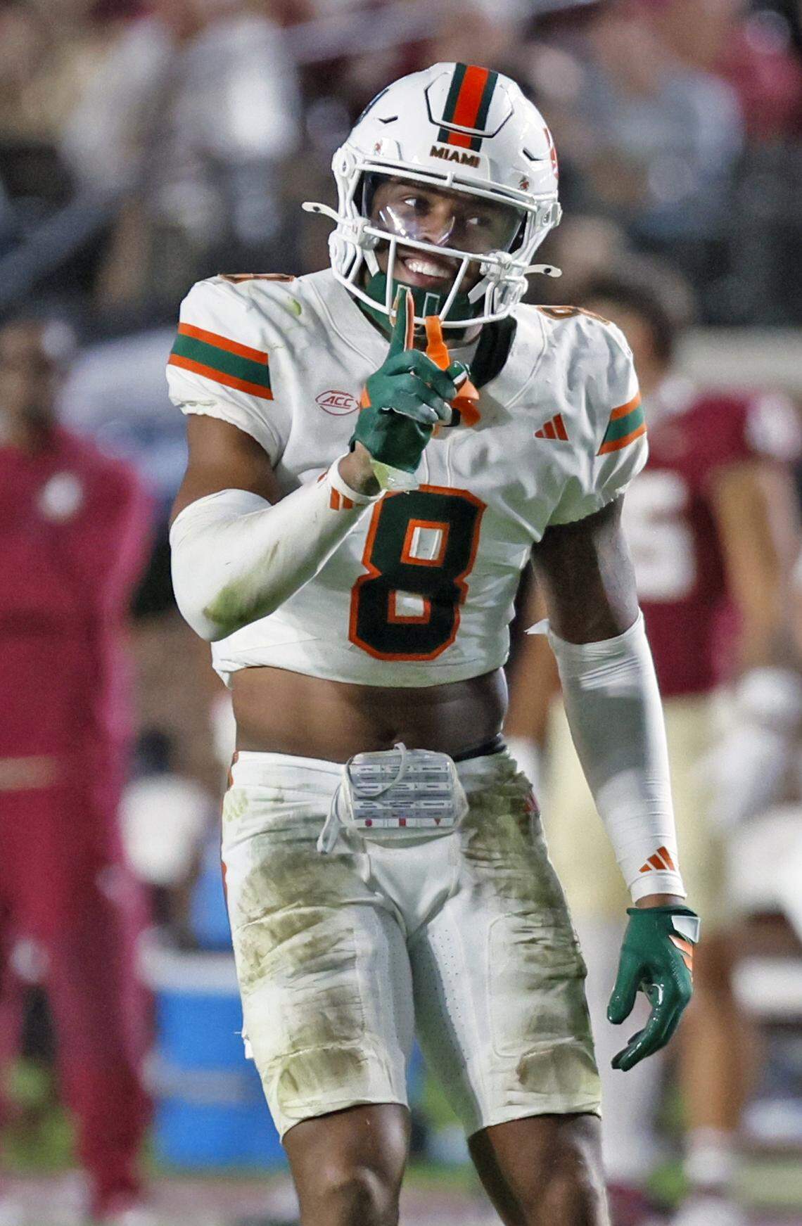 Miami Hurricanes defensive back Jakobe Thomas (8) reacts after making a stop against the Florida State Seminoles during the first half of their NCAA game at Doak Campbell Stadium in Tallahassee, Florida, on Saturday, October 4, 2025.