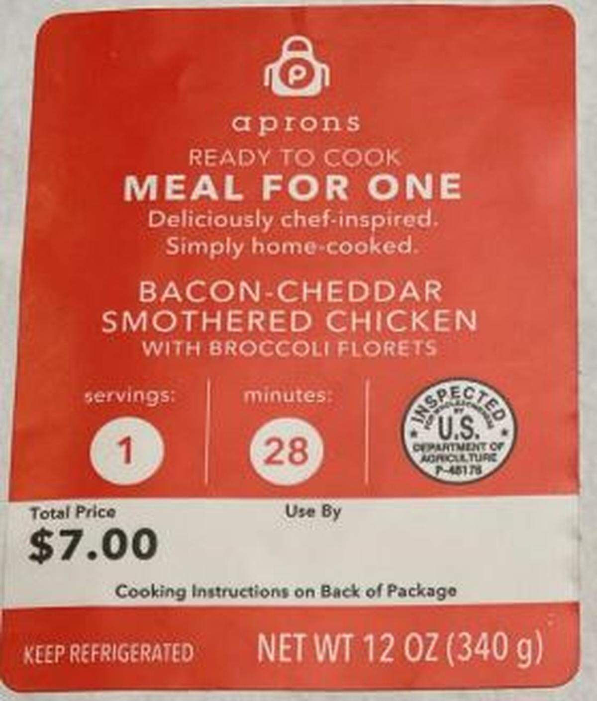 The label of Apron’s Ready to Cook Meal for One Bacon-Cheddar Smothered Chicken