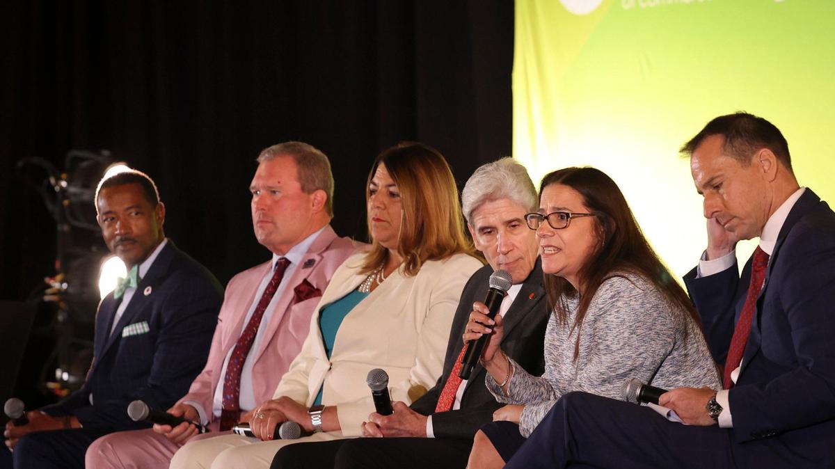 Elizabeth Béjar, provost of Florida International University, second from right, speaks on a panel of South Florida university and college leaders during a Greater Miami Chamber of Commerce luncheon on Wednesday, April 5, 2023, at the Jungle Island Bloom Ballroom.