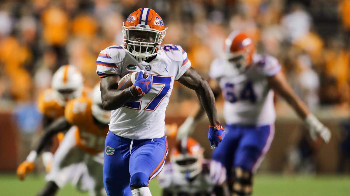 Florida Gators’ Joshua Tse (27) picks up a lot of yards during the game between the Florida Gators and Tennessee Volunteers at Neyland Stadium on Sept. 22, 2018 in Knoxville, Tennessee. Florida won the game 47-21.