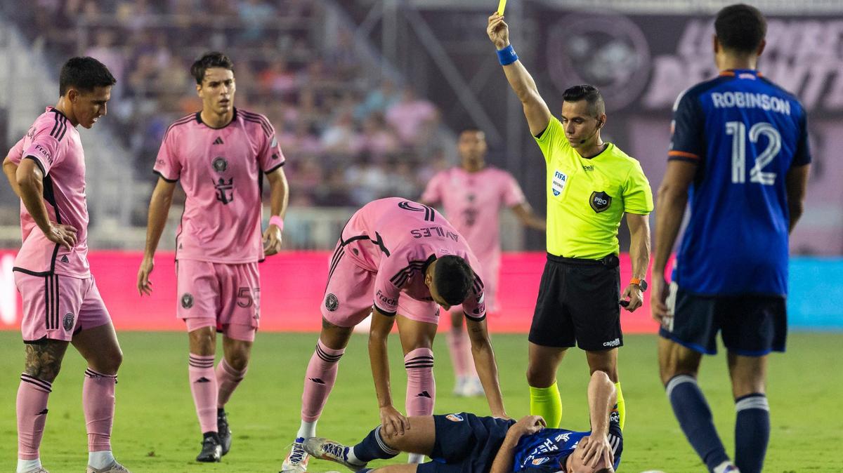 Inter Miami center back Tomás Aviles (6) receives a yellow card after fouling FC Cincinnati midfielder Pavel Bucha (20) in the first half of their MLS match at Chase Stadium on Saturday, Aug. 24, 2024, in Fort Lauderdale, Fla.