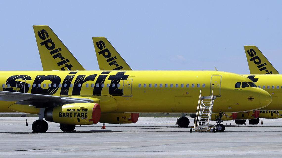 A woman was removed from a Spirit Airlines flight and arrested, authorities say.