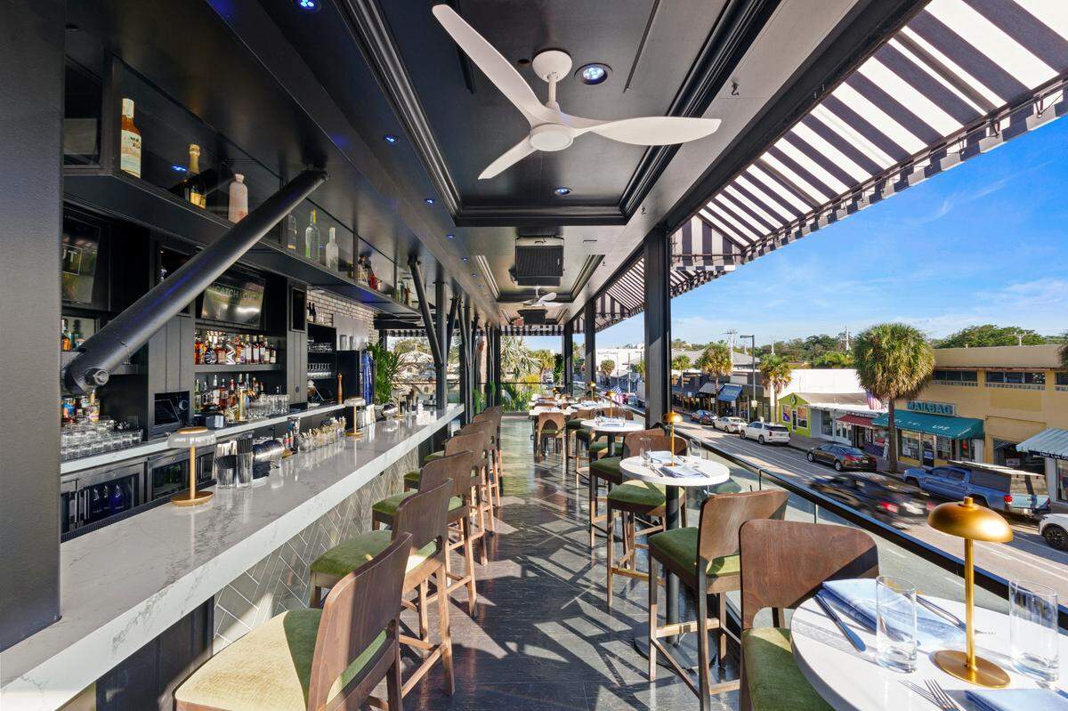 The upstairs outdoor bar at Catch & Cut overlooks Las Olas Boulevard in Fort Lauderdale.