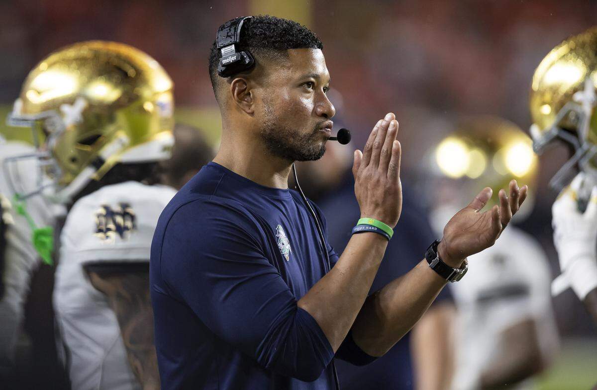 Notre Dame Fighting Irish head coach Marcus Freeman reacts as his team plays against the Miami Hurricanes in the first half of their NCAA football game at Hard Rock Stadium on Sunday, Aug. 31, 2025, in Miami Gardens, Fla.