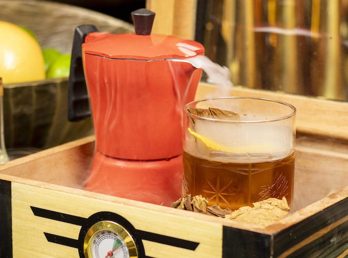 Cafetera Old Fashioned at the sneaker-themed Grails sports bar in Wynwood is made with rum and includes a separate cold brew coffee reduction served in a moka pot coffee maker with liquid nitrogen