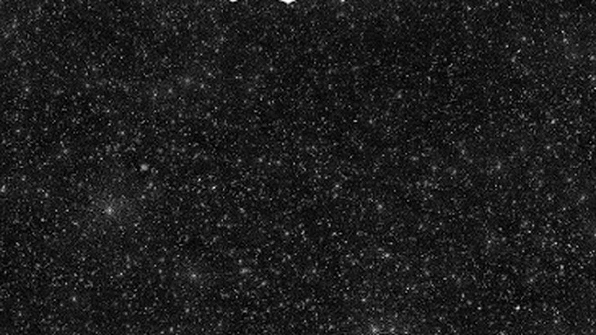 Sky map showing 25,000 supermassive black holes. Each white dot is a supermassive black hole in its own galaxy.