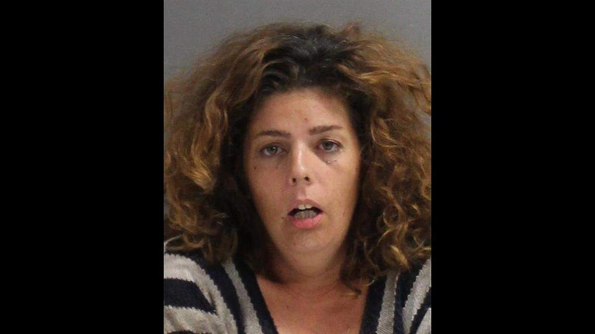 Edgewater police arrested Amanda Goodwin, 37, after a witness told them they say saw her try to drown a cat to bring it “closer to Jesus.”