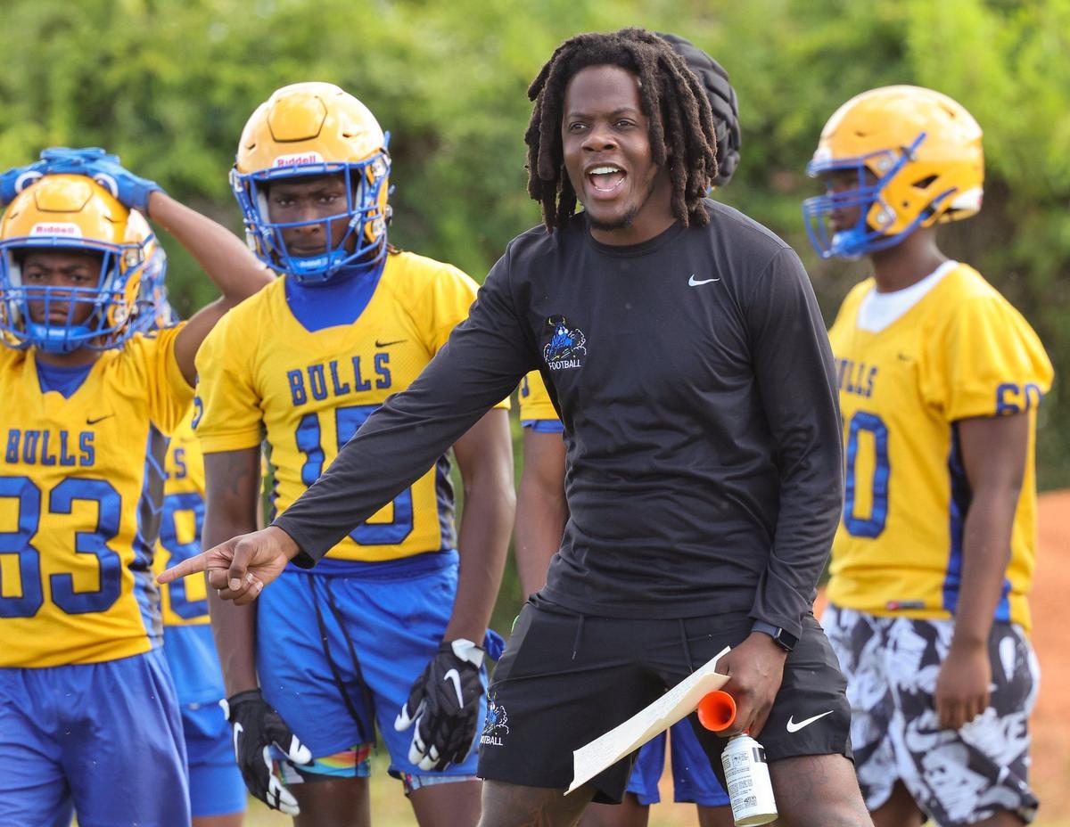 Miami Northwestern alum and head football coach Teddy Bridgewater, a former Miami Dolphins quarterback, coaches from the sideline during practice on Monday, April 29, 2024 in Miami, Florida.