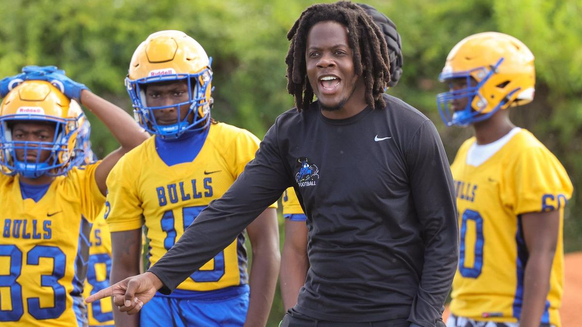 Miami Northwestern alum and head football coach Teddy Bridgewater, a former Miami Dolphins quarterback, coaches from the sideline during practice on Monday, April 29, 2024 in Miami, Florida.