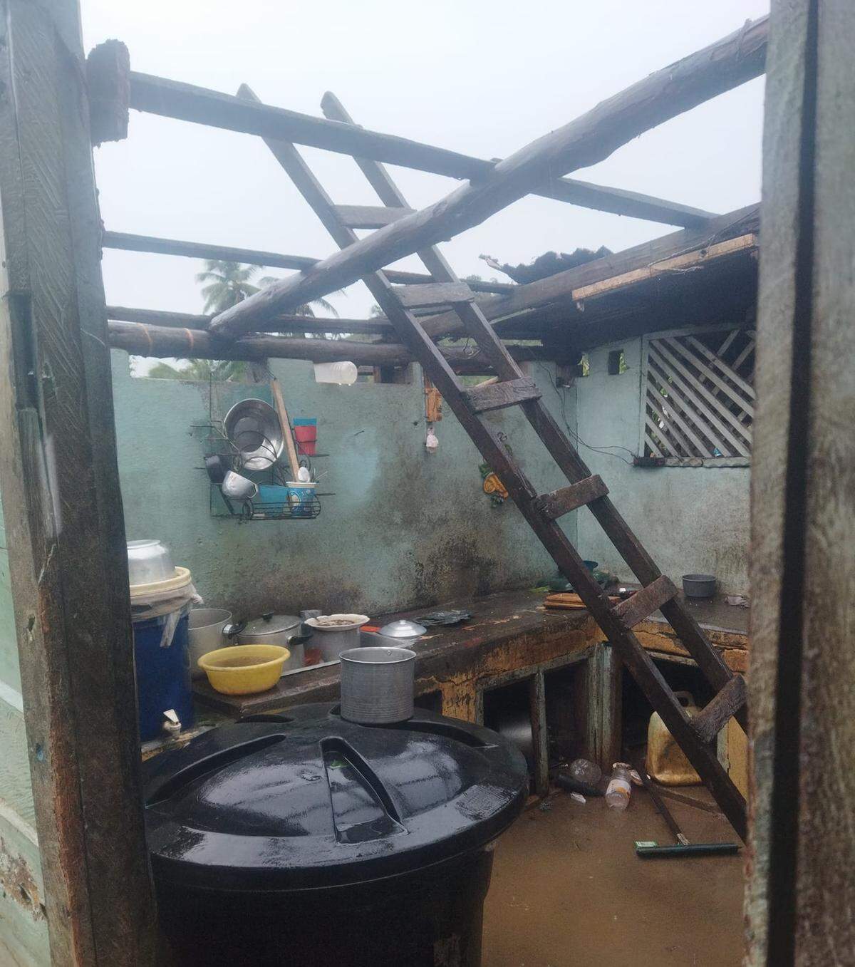 A home lost its roof in El Jamal, near Baracoa, a city in Guantánamo province in Cuba, after Hurricane Oscar made landfall nearby on Sunday.
