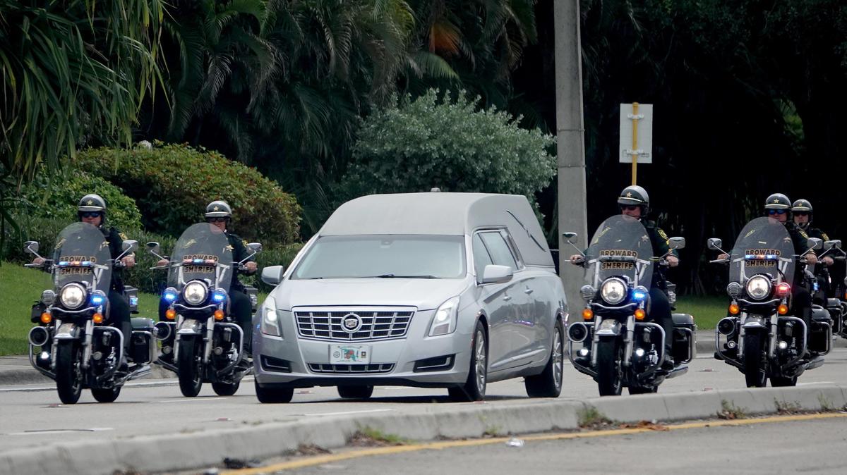 The hearse carrying the remains of Broward Sheriff’s Office Deputy Benjamin Nimtz arrives at Calvary Chapel in Fort Lauderdale on Thursday, Aug. 1, 2019.
