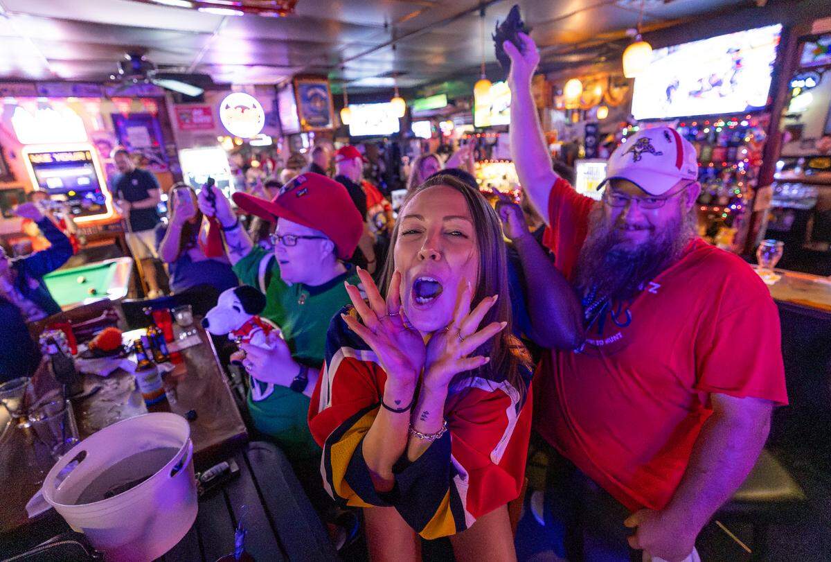 Florida Panthers fan Michelle Choquette cheers after her team scored against the Edmonton Oilers to win Game 2 of the NHL Stanley Cup Final at the Inn Field Bar & Grill on Friday, June 6, 2025, in Sunrise, Fla.