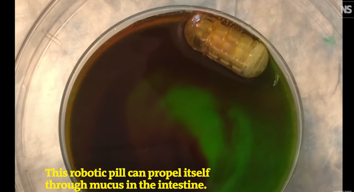 The robotic pill is coated in a gel that dissolves in the stomach, exposing the machine which is activated by pH in the digestive tract, researchers say.