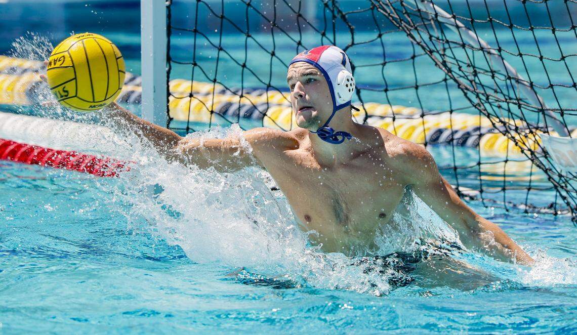 St. Thomas Aquinas High School's goal keeper Marcell Varhalmi blocks a shot during match against Ransom Everglades during boys' water polo FHSAA State Championship game at Belen Jesuit School in Miami, Florida, on Saturday, April 25, 2026.