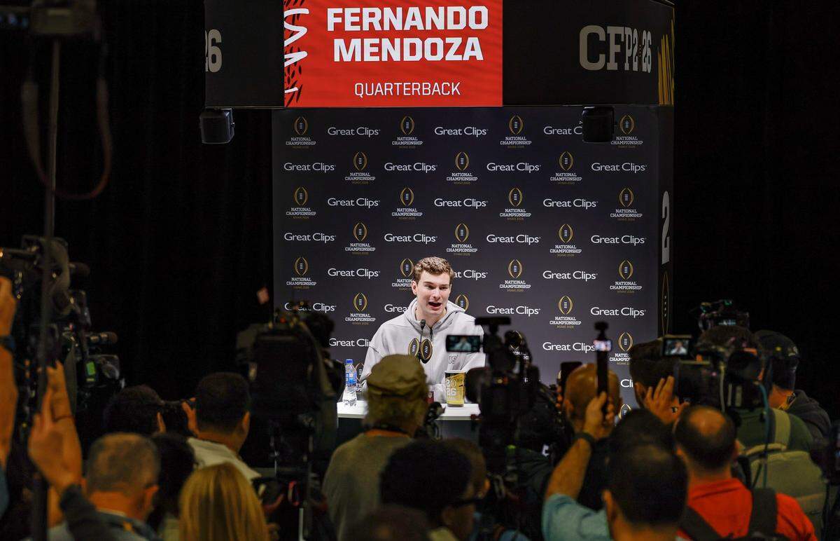 Indiana Hoosiers quarterback Fernando Mendoza (15)  speaks to reporters during Media Day for the 2026 CFP National Championship at the Miami Beach Convention Center on Miami Beach, Florida, on Saturday, January 17, 2026.