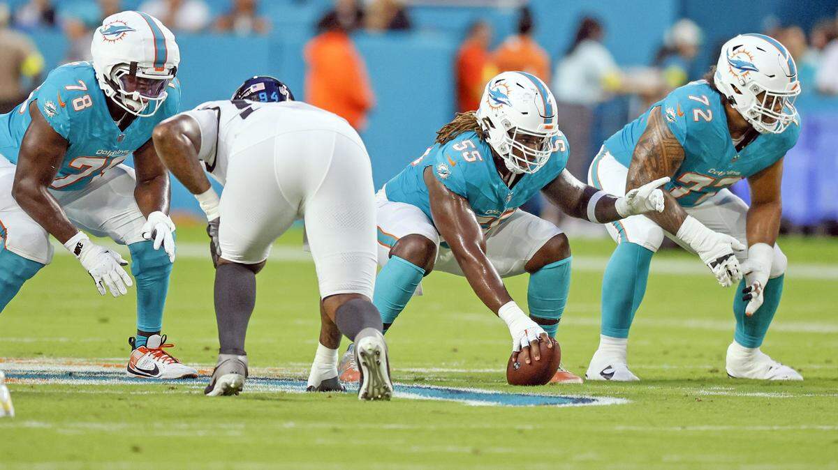 Miami Dolphins guard James Daniels (78) guard Aaron Brewer (55) and guard Jonah Savaiinaea (72) at the line of scrimmage during an NFL football game against the Jacksonville Jaguars at Hard Rock Stadium in Miami Gardens, Florida, on Saturday, August 23, 2025. 

