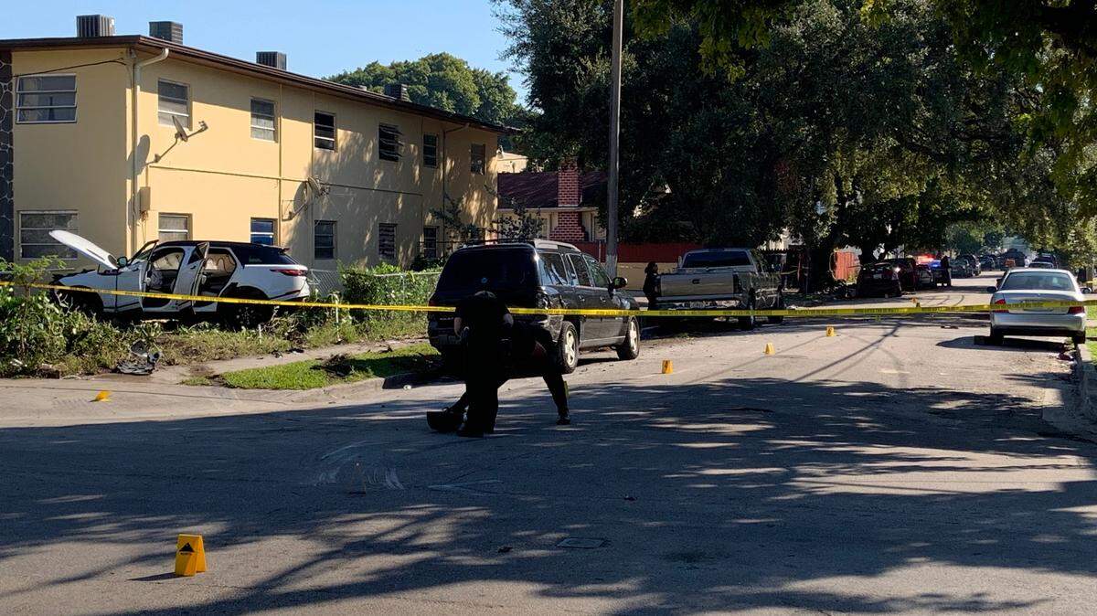 Miami police arrested 17-year-old Fernando Altamirano as the driver of the white Range Rover in the apartment building yard to the left. The hit-and-run crash killed Mayra Sanchez, the driver of the red Nissan, the rear of which can be seen in the shade on the left side of Northwest 11th Avenue.