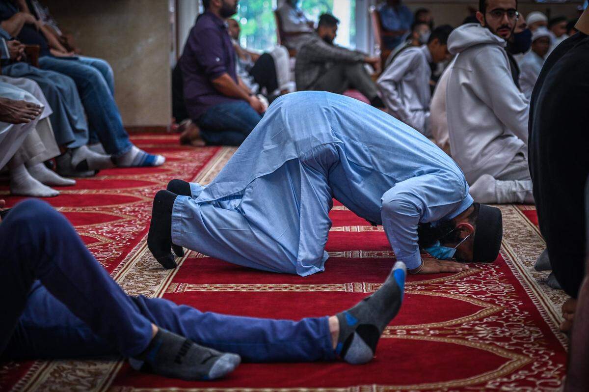 Worshipers pray in Masjid An-Noor, located in West Kendall, in April.