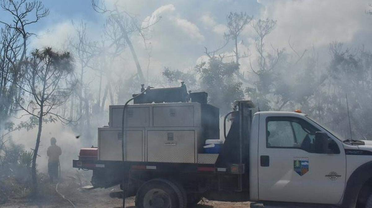 Crews continue to work on the Big Pine Key brush fire, which broke out Sunday, April 22, 2018.