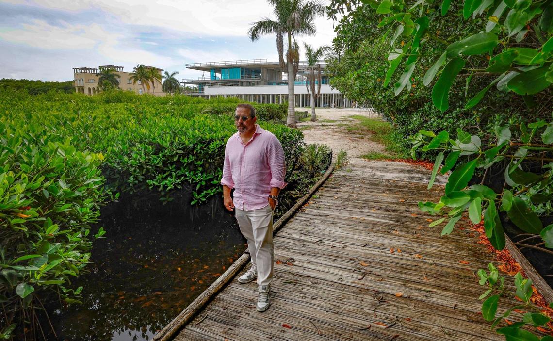 Developer Manny Angelo Varas, president of MV Group USA, walks near the mangroves at G House, a new $50 million private mansion being developed where Hurricane Andrew had its highest storm surge in Miami-Dade.