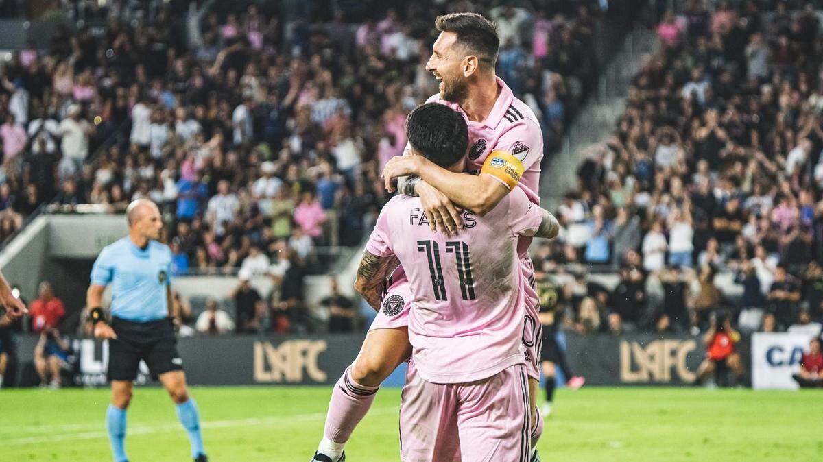 Lionel Messi celebrates with Facundo Farias (11) who scored the first goal in Inter Miami’s 3-1 road win over Los Angeles FC