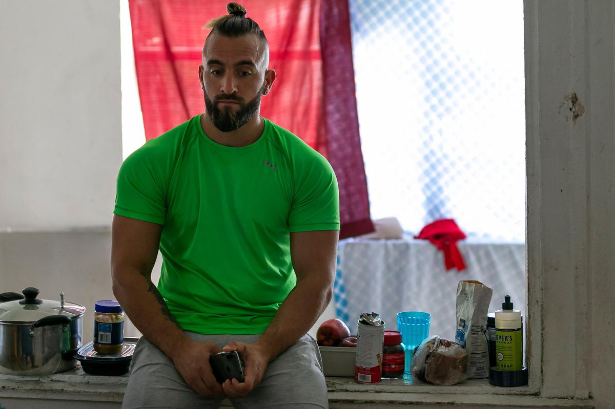 Damian Camarotta, 33, is living in a dilapidated property with other Argentinean tourists whose flights home were canceled due to the coronavirus pandemic.