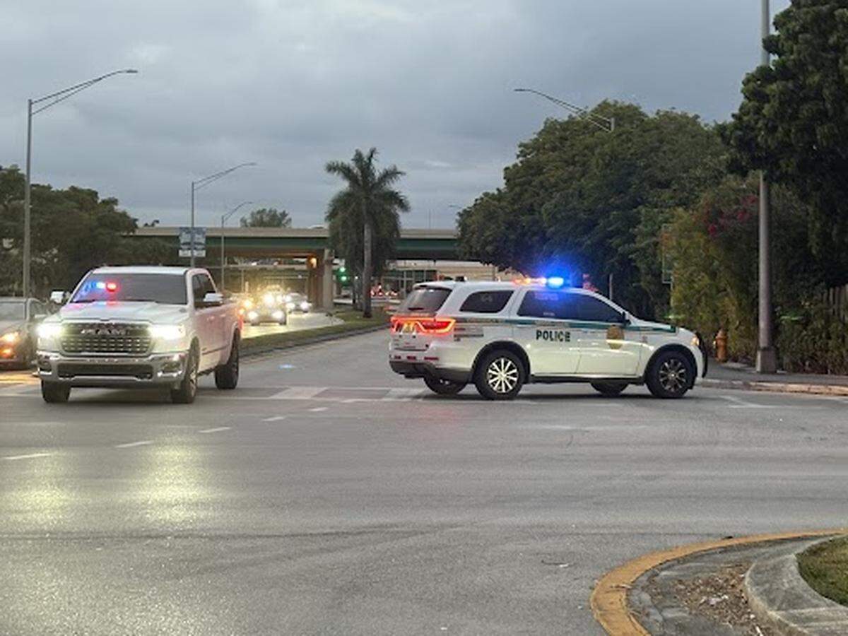 Miami -Dade Sheriff’s Office deputies block the on-ramp to Florida’s Turnpike at SW 120th Street on Friday after a deputy was shot nearby.