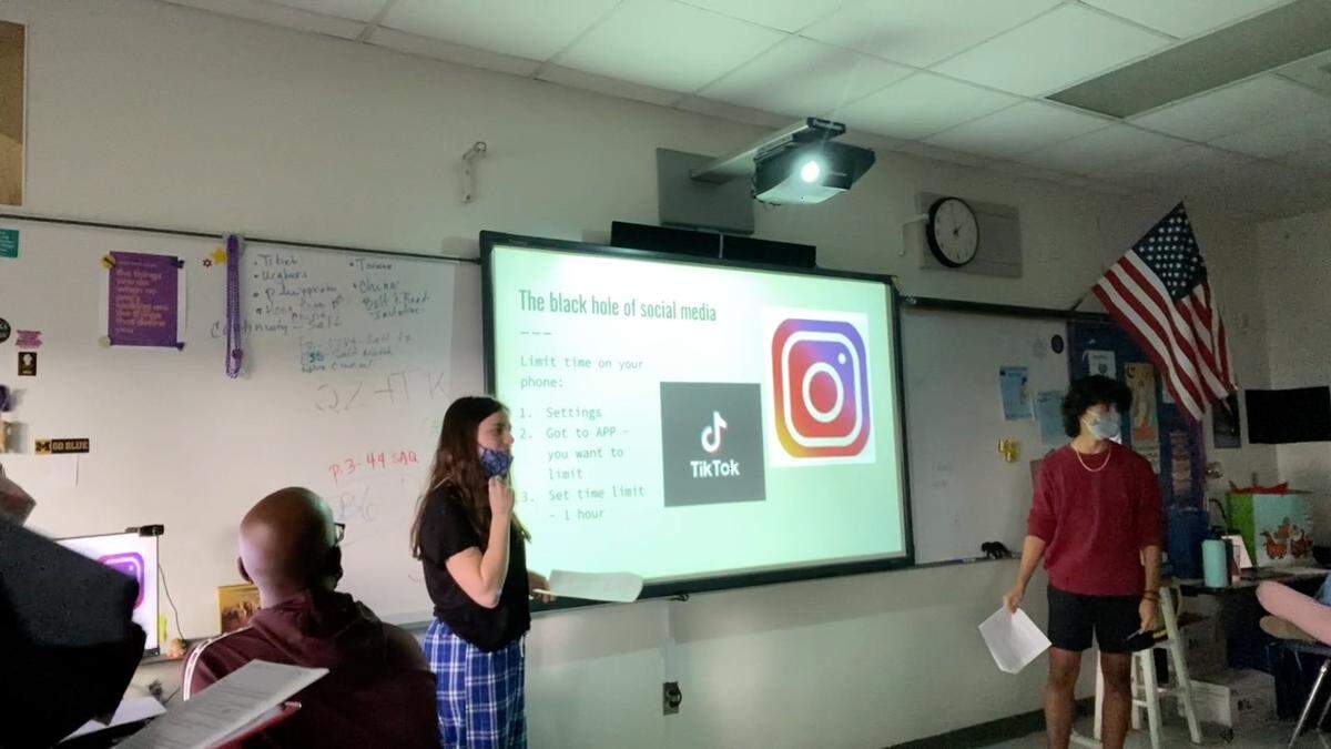Abbie Lambert gives a presentation on Day 4 of Project DIGIT at Palmetto Senior High.